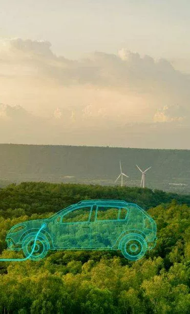 Vindkraftverk i ett grönt landskap