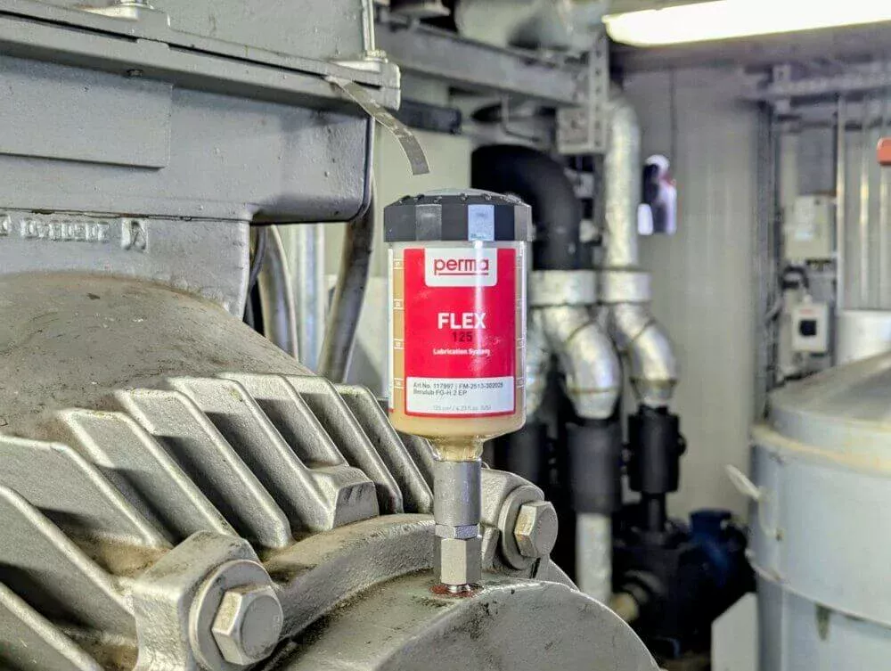 Perma-dispenser som används på en maskin