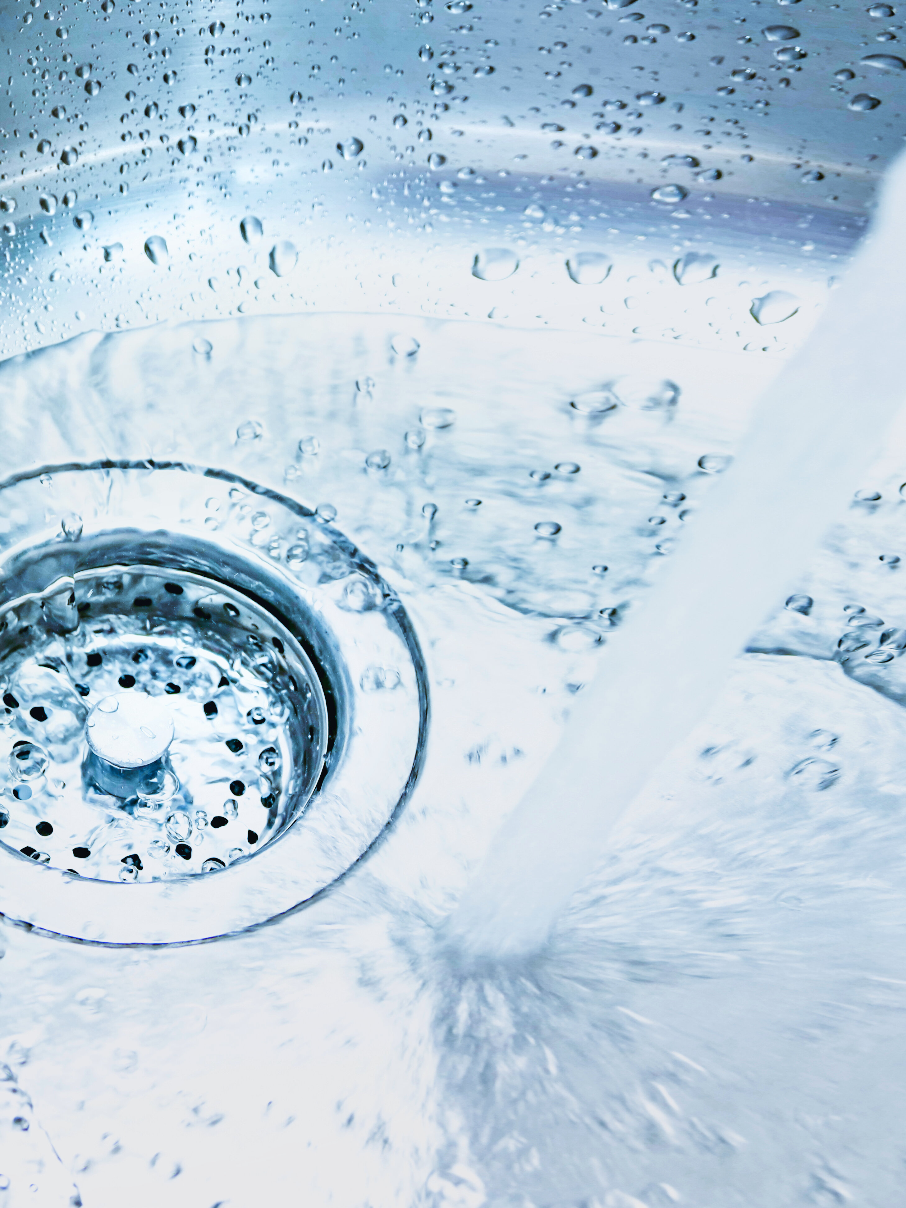 Bricka i rostfritt stål med avlopp